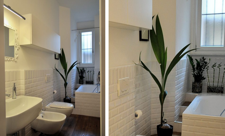 bagno total white con specchio barocco e piastrelle diamantate