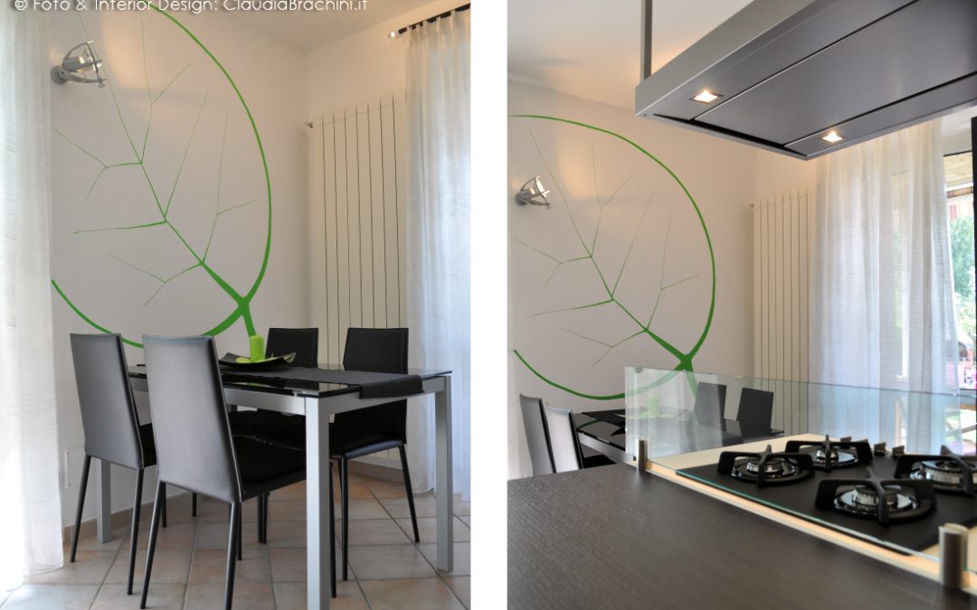 cucina bianca e rovere grigio con foglia verde